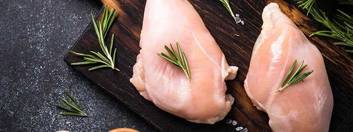 Fresh poultry meat: white breast meat without skin from broilers.